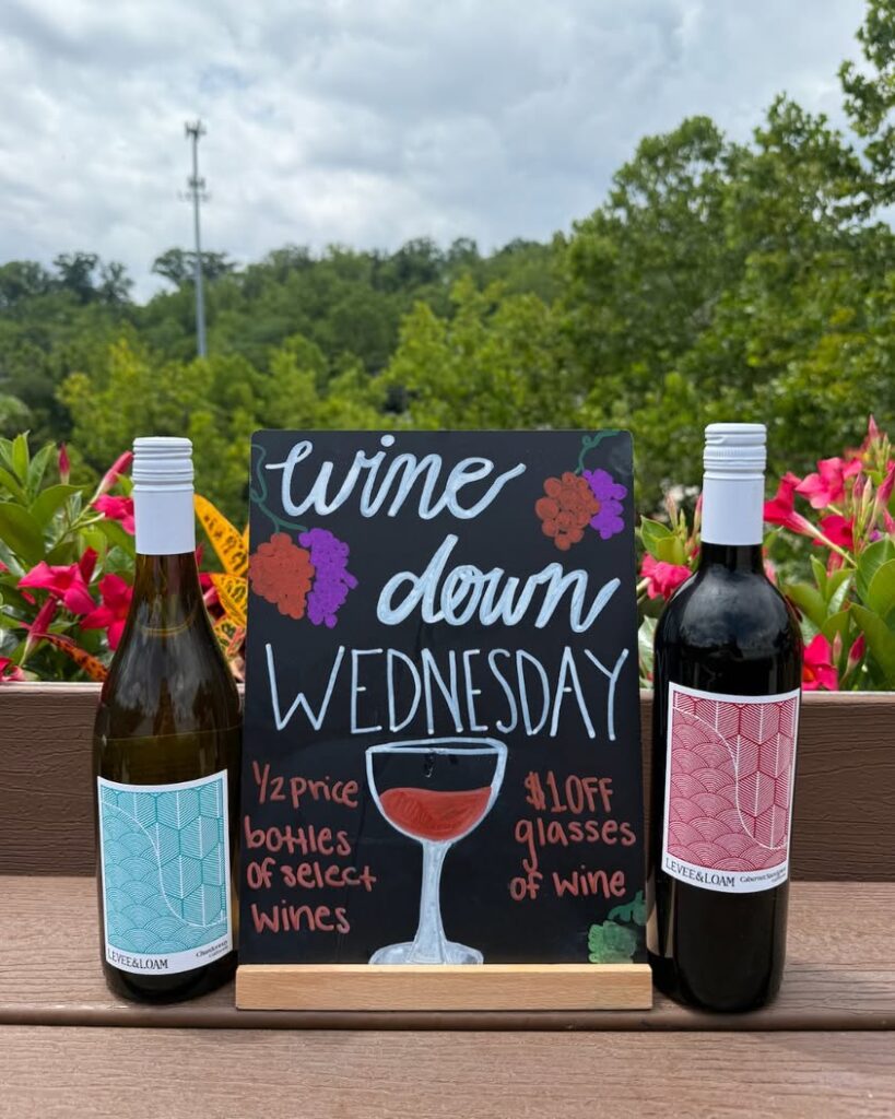 Wine Down Wednesday event preview featuring Levee & Loam Chardonnay and Cabernet Sauvignon bottles at Little Miami Brewing Company.