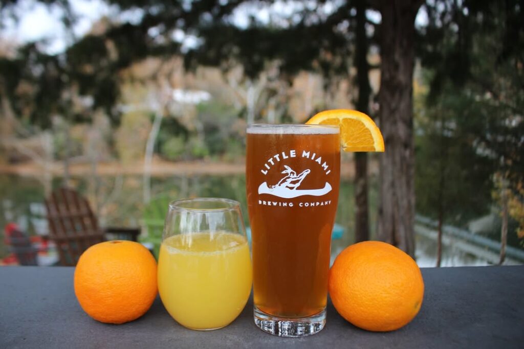 Pair of white nylon parade gloves with snap-closure cuffs designed for formal flag presentations and ceremonies.