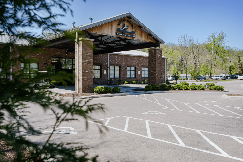 The Little Miami Brewing Company in Milford, a potential venue for a rehearsal dinner. It offers a rustic exterior with ample parking.