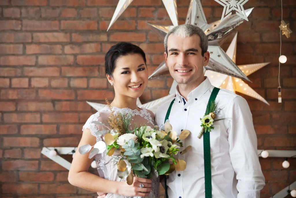Couple posing at a brewery wedding