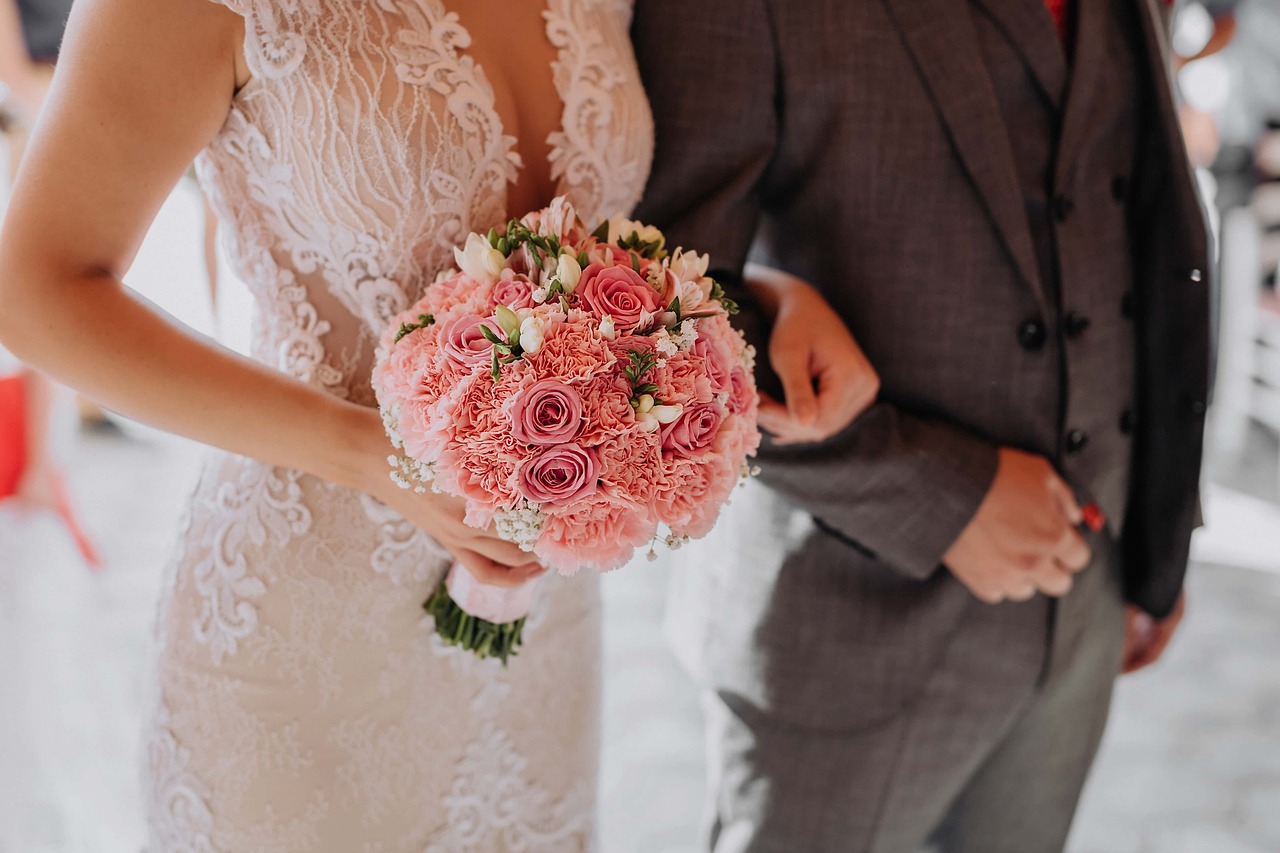 Bride and groom sharing a quiet moment with bouquet at Little Miami Event Centre in Cincinnati.