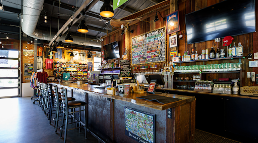 Indoor view of the brewery taproom at the Little Miami Brewing Company, featuring rustic décor and inviting ambiance.